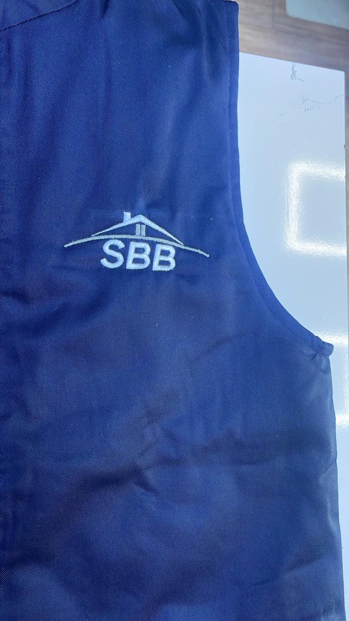 Tablier brodé SBB — équipe sur chantier